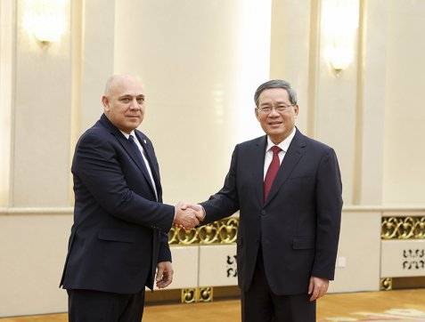 李强会见古巴共产党代表团